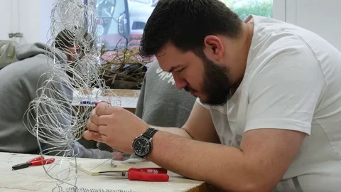 Students in art class create a work of art Stock Footage 69302381