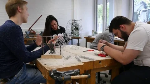 Students in art class create a work of art Stock Footage 69303406