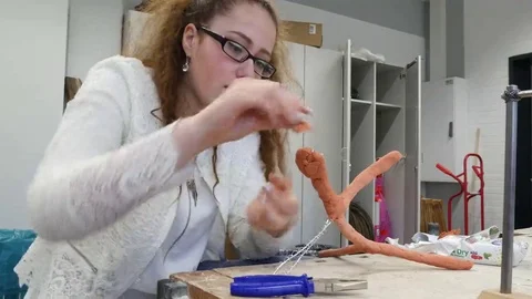 Students in art class create a work of art Stock Footage 69304156