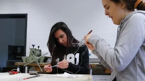 Students in art class create a work of art Stock Footage 69304440