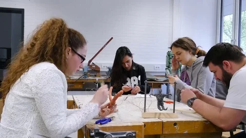 Students in art class create a work of art Stock Footage 69304601