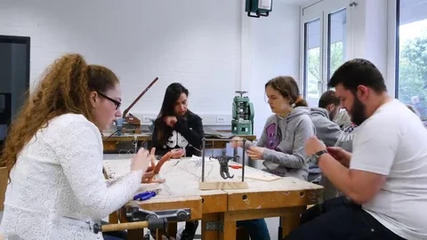 Students in art class create a work of art Stock Footage 69304958
