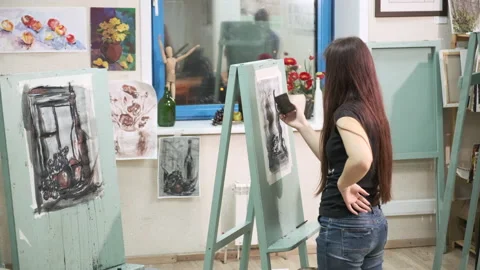Students of the art school draw with paints on canvas Stock Footage 144951222