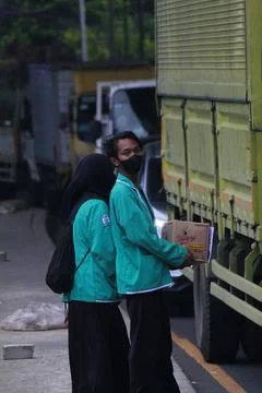 Students Asking For Some Donations from someone passed by Stock Photos