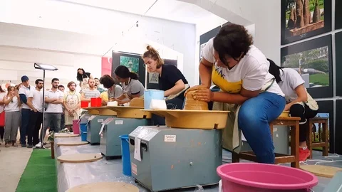 Students attending to the pottery contest at the 12th International Eskisehir Stock Footage 104076282