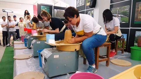 Students attending to the pottery contest at the 12th International Eskisehir Stock Footage 104076295