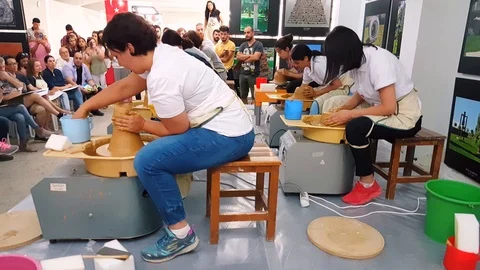 Students attending to the pottery contest at the 12th International Eskisehir Stock Footage 104076325