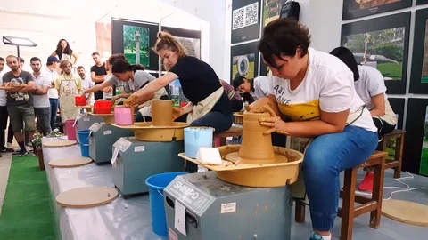 Students attending to the pottery contest at the 12th International Eskisehir Stock Footage 104076362