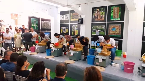 Students attending to the pottery contest at the 12th International Eskisehir Stock Footage 104076438