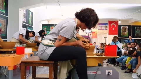 Students attending to the pottery contest at the 12th International Eskisehir Stock Footage 104076535