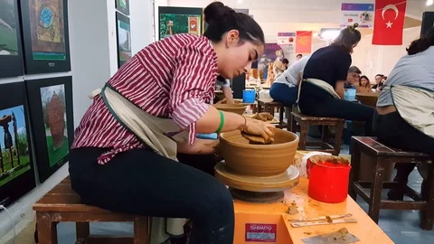 Students attending to the pottery contest at the 12th International Eskisehir Stock Footage 104076563