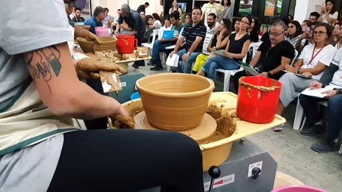 Students attending to the pottery contest at the 12th International Eskisehir Stock Footage 104076570