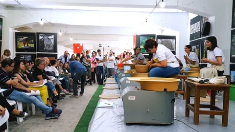 Students attending to the pottery contest at the 12th International Eskisehir Stock Footage 104076711