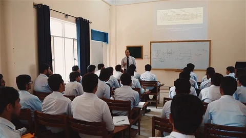 Students attending their daily class lecture Stock Footage 116995772
