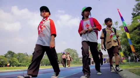Students with Boy Scout (Pramuka) Uniform Walking at Jogging Track Video stock 132295332