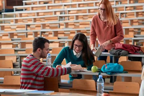 Students at a break talking about the lesson Stock Photos