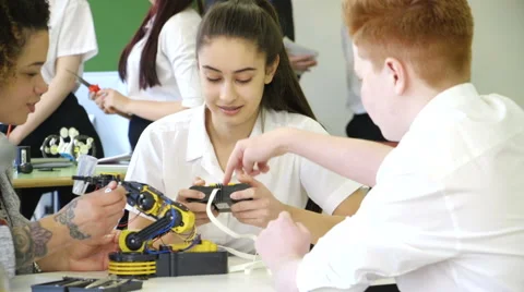 Students building a robotic arm Stock Footage 61855082