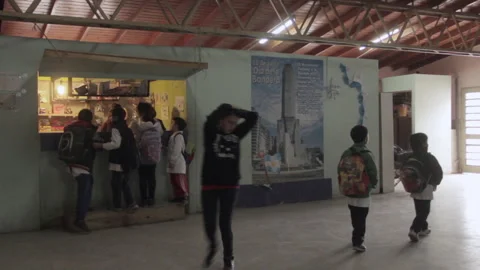 Students Buying Snacks At School Canteen Kiosk In Public School Hallway Vídeo Stock 344415774
