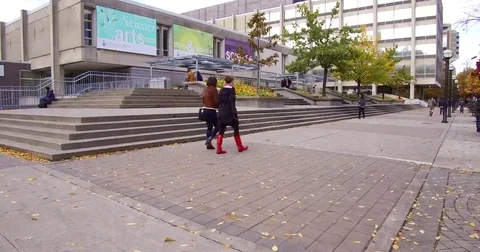 Students on campus at University of Toronto Stock Footage 69182579