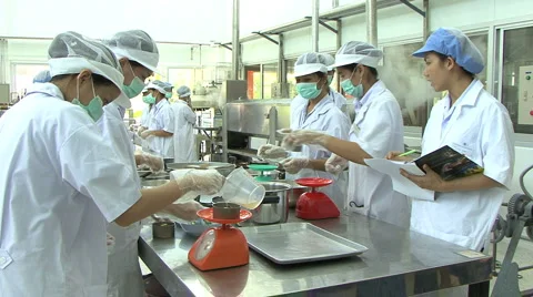 Students At A Canning Factory 스톡 동영상 1068958