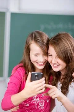Students with cellular phone Stock Photos