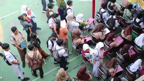Students in Central Java Indonesia enrolling in a Vocational High School Stock Footage 243871650