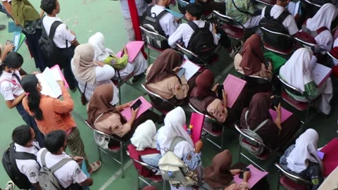 Students in Central Java Indonesia enrolling in a Vocational High School Stock Footage 243871651
