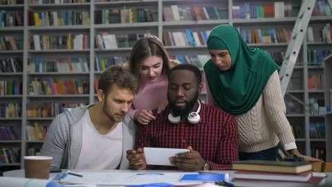 Students checking exam grades online on tablet Stock Footage 101992350