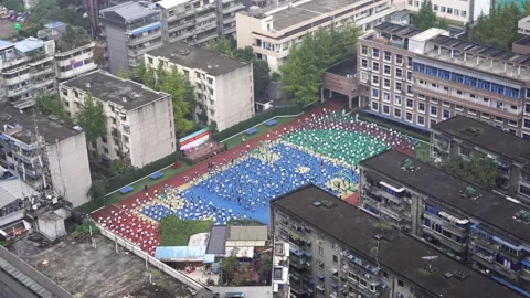 Students of Chinese middle school doing exercises outside. Stock Footage 131515625