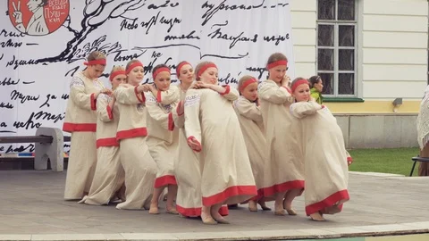 Students of choreographic school perform on small stage. The day of the country Stock Footage 110079304