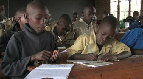 Students in class take notes in a school in Rwanda, Africa Stock-Footage 113819