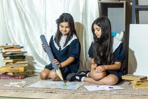Students in classroom doing homework Stockfoto's
