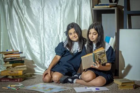Students in classroom doing homework Stock Photos