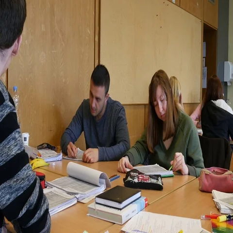 Students in the classroom during a writing task. Stock Footage 69356507