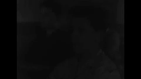 Students in classrooms, an atomic bomb blast, a warplane, a rocket, World War 库存影片 137522949