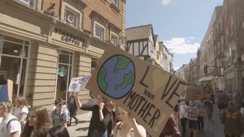 Students on climate protest march in York 스톡 동영상 149834701