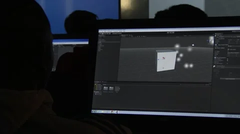Students in a computer classroom working with unity software for game designing. Stock Footage 48709563