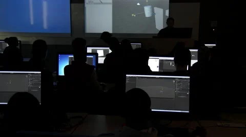 Students in a computer classroom working with unity software for game designing. Stock Footage 48709576