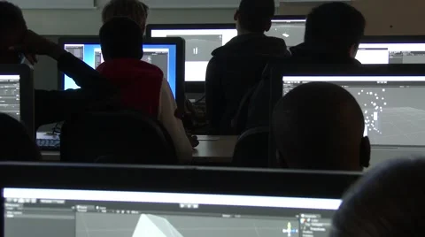 Students in a computer classroom working with unity software for game designing. Stock Footage 48709578