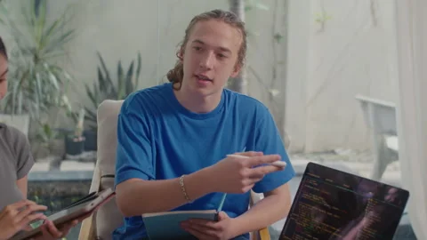 Students of Computer Science Faculty Discussing New Project at Home Stock Footage 253929182