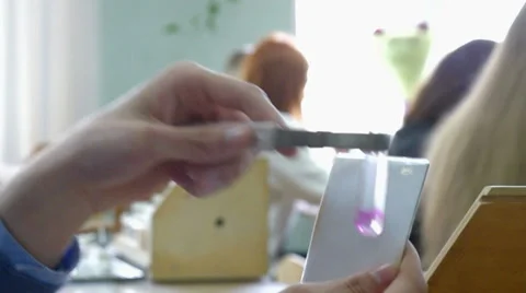 Students conduct experiments in chemistry Stock Footage 62522202