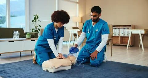 Students, cpr or nurses teaching with mannequin for first aid practice, cardiac 写真素材
