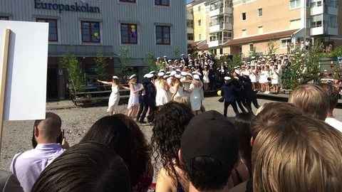 Students dance in SloMo at Studenten  - High school graduation in Sweden Stock Footage 109598385
