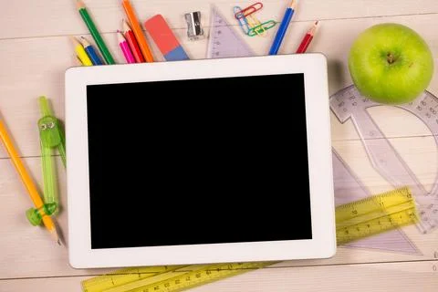 Students desk with tablet pc Stock Illustration