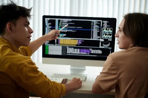 Students Discussing Programming Code Photos