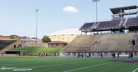 Students from Dobyns Bennett High School march to J Fred Johnson Stadium to view Stock Footage 79543147