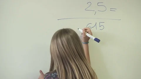 Students doing math operation on a whiteboard 스톡 동영상 79161313