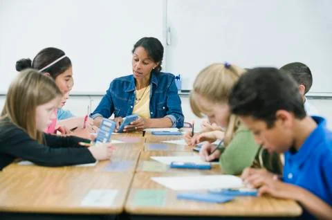 Students doing math work in classroom Stock Photos