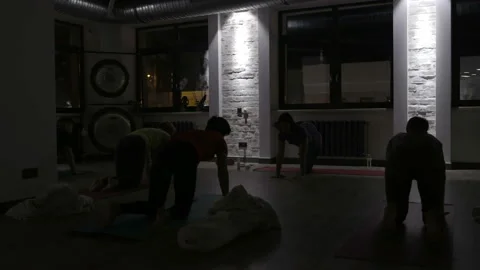 Students doing yoga at the evening 스톡 동영상 102694584