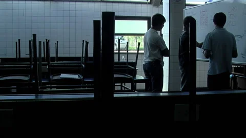 Students Drawing an Electrical Circuit Board in an Empty Classroom After Hours. Video stock 233386764
